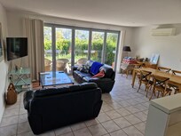 Main room. Signs on doors ask not to use bifold.