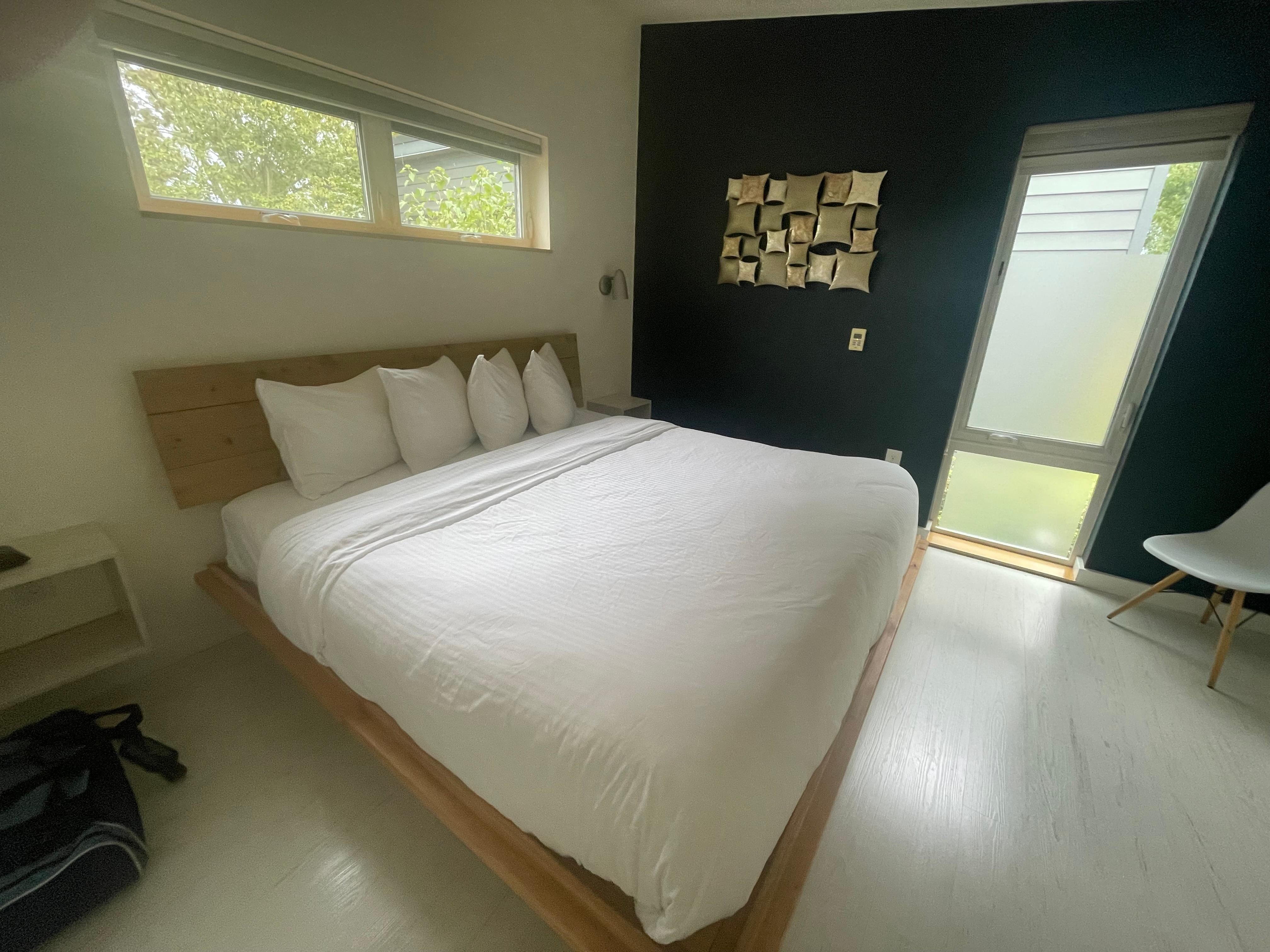 Bedroom with to and lovely bathrobes