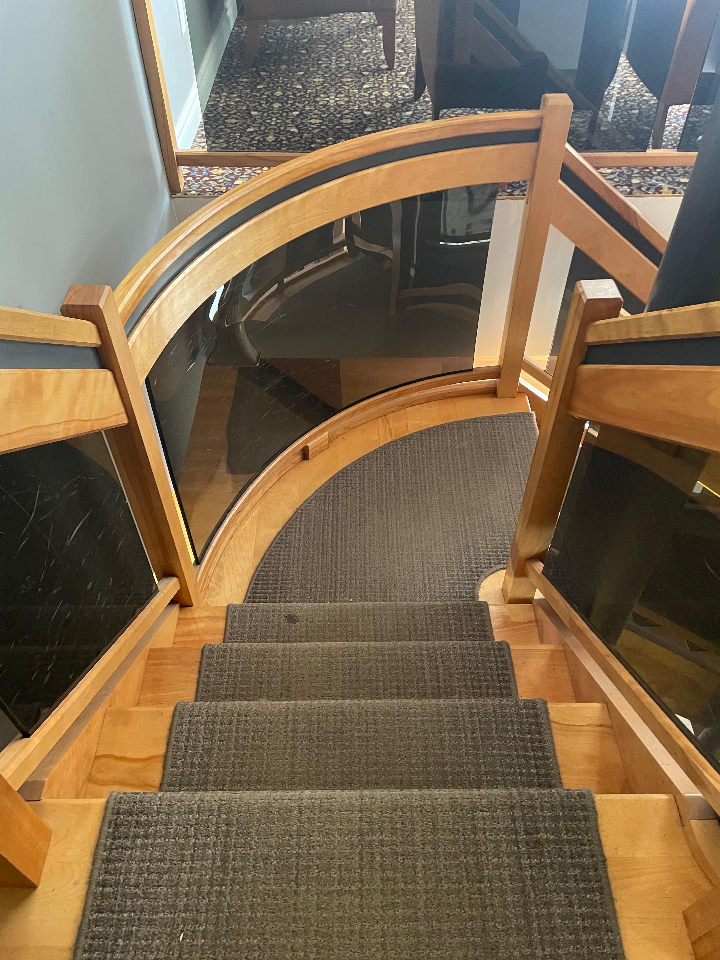 Spiral staircase to the two upper floors. No elevator. 