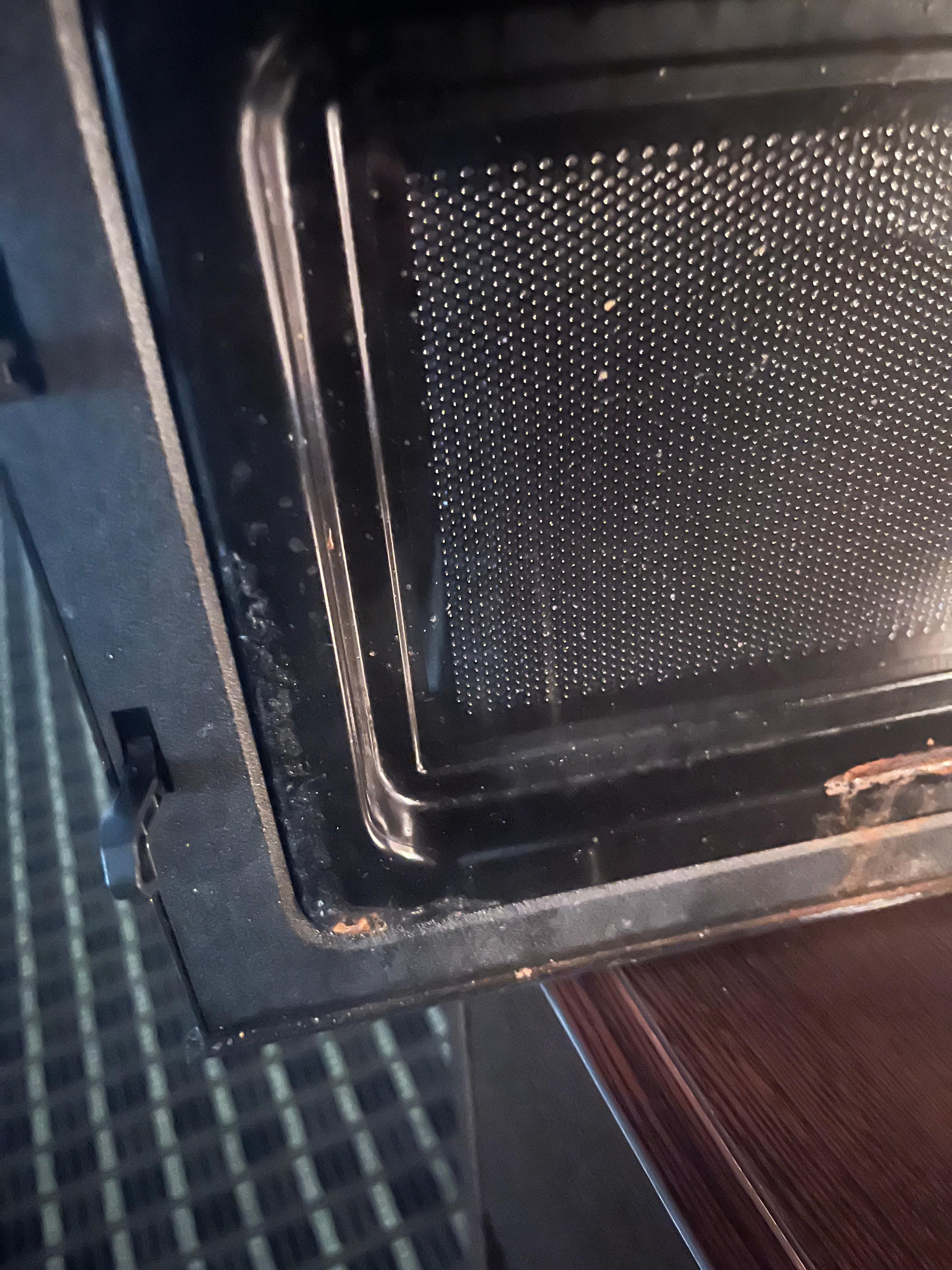 Inside rusty microwave 