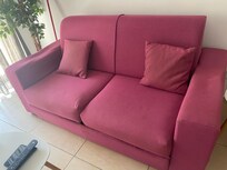 Tired and stained sofa bed