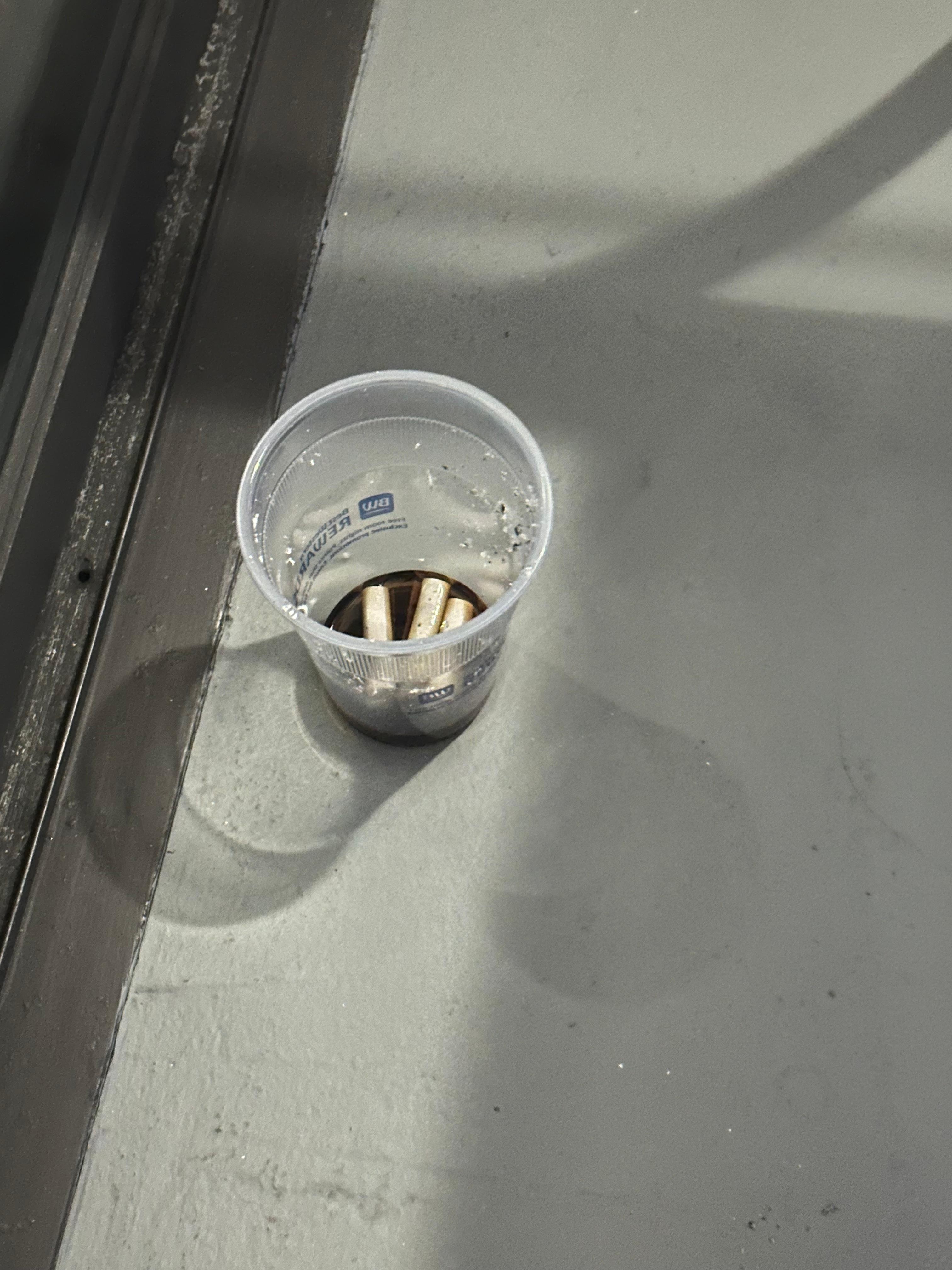 Concrete butts from last guest on balcony of nonsmoking room.