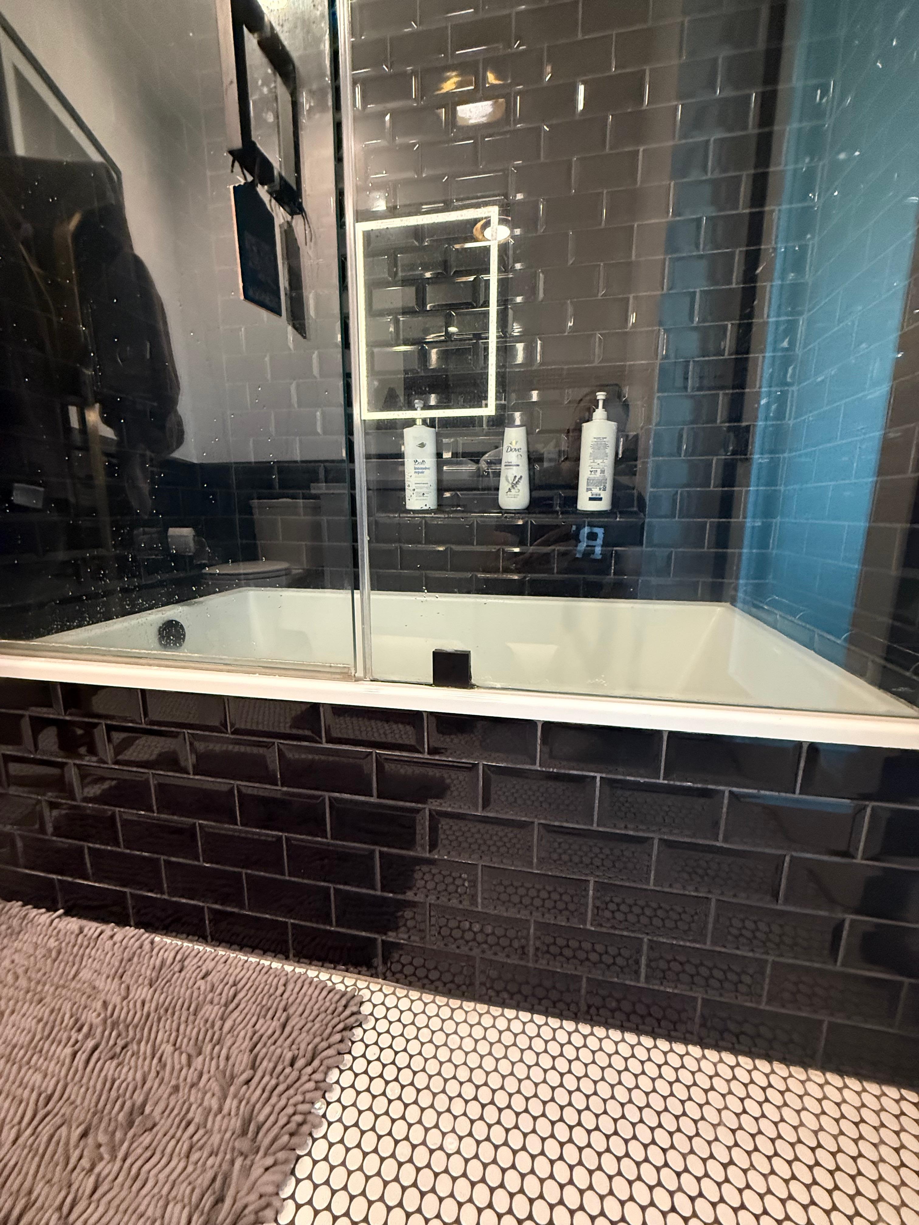 This bathtub came up to my knee and I am a 6' tall man.  Also, absent of a non-slip mat, it was dangerous to use.