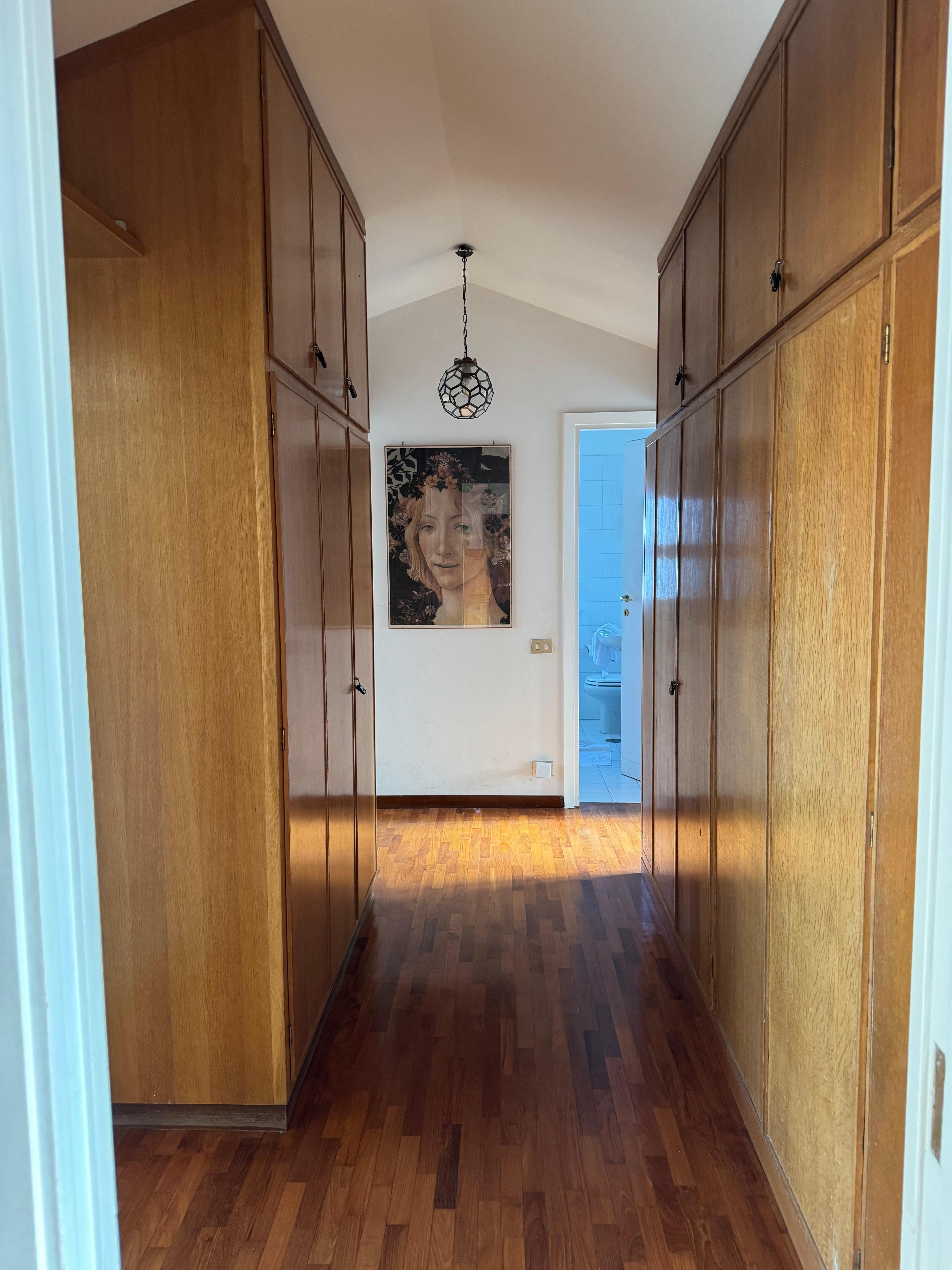 Big, deep
closet spaces in the hallway of the bedroom wing. 