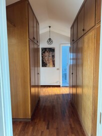 Big, deep
closet spaces in the hallway of the bedroom wing.