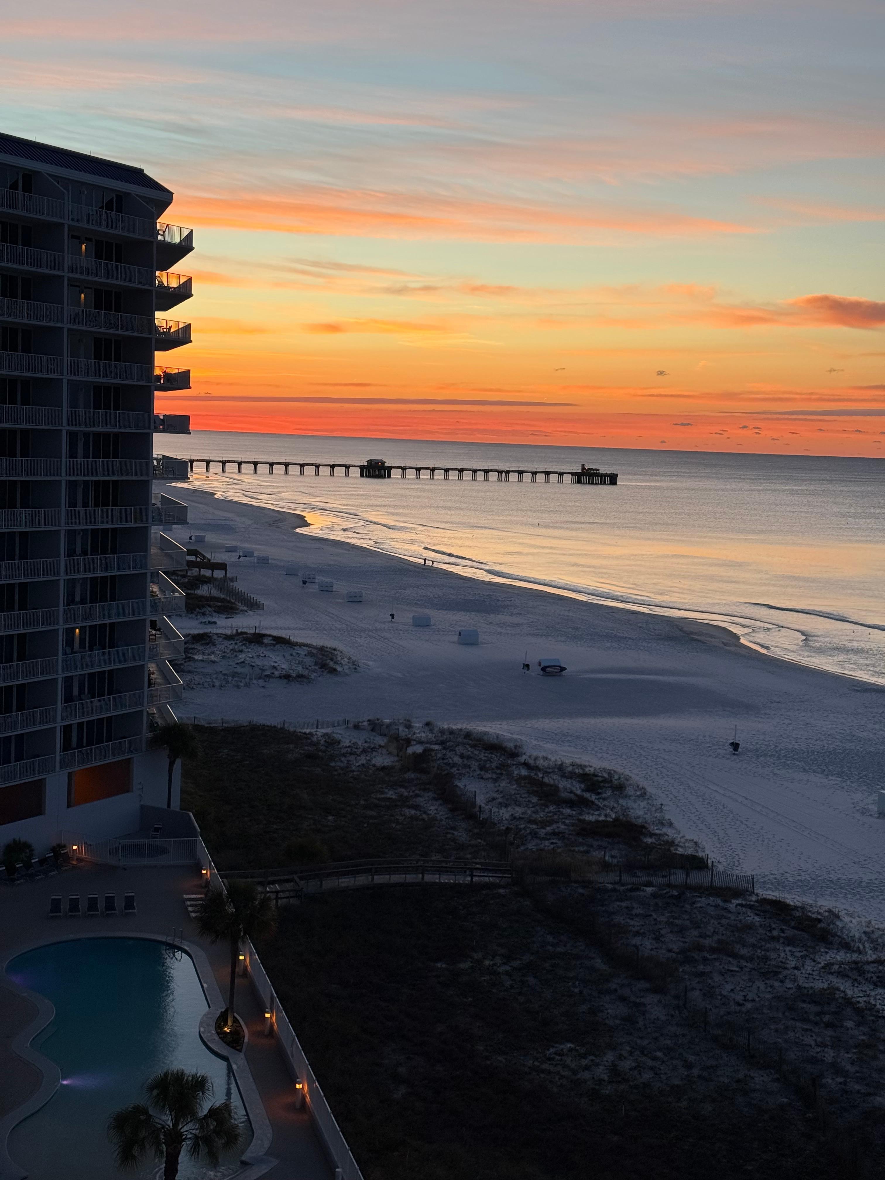 Sunrise view of pier in March from Lighthouse 916 balcony Gulf Shores
