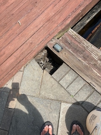 Large hole in pavers.