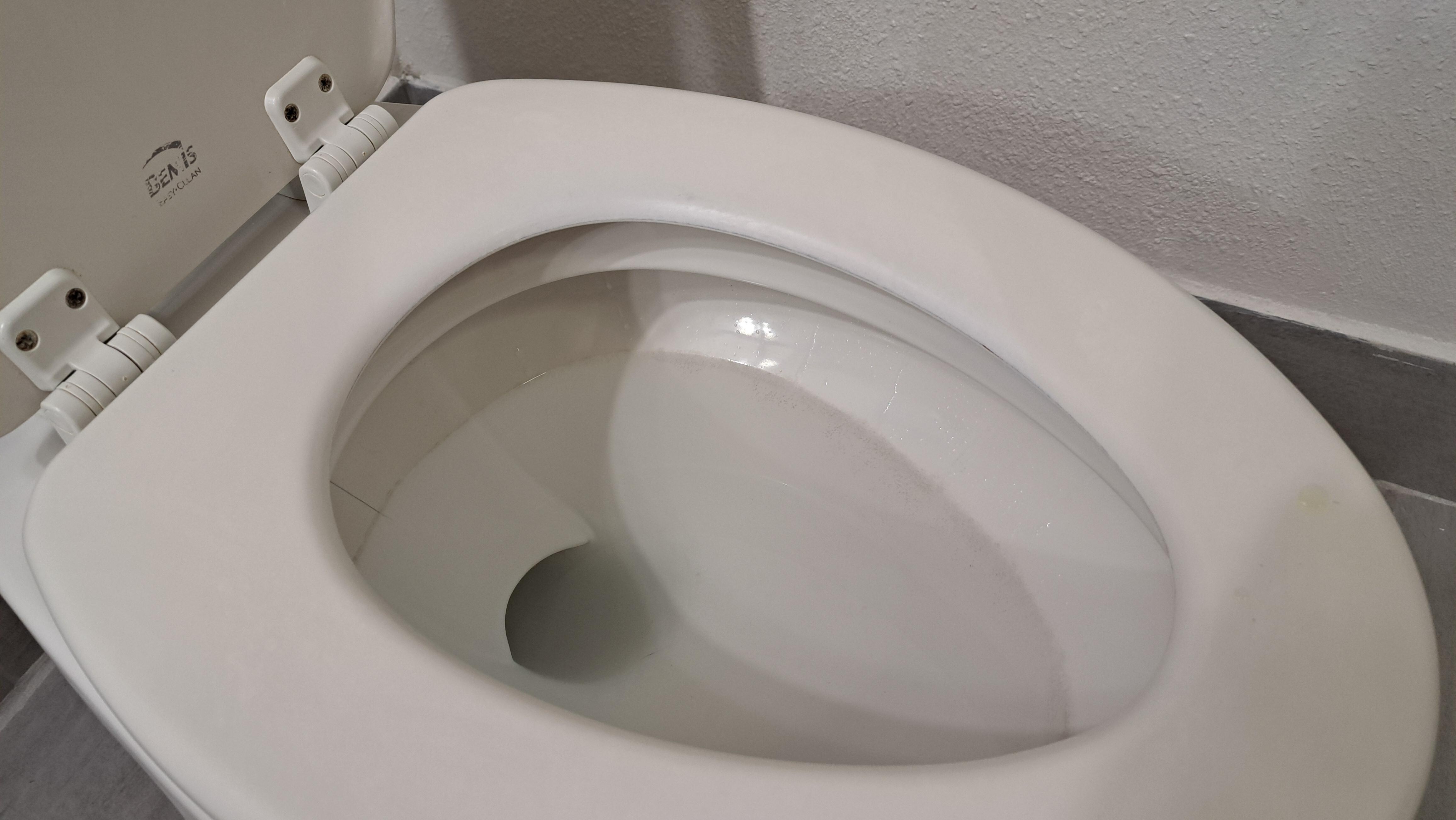 Lime scale in commode 