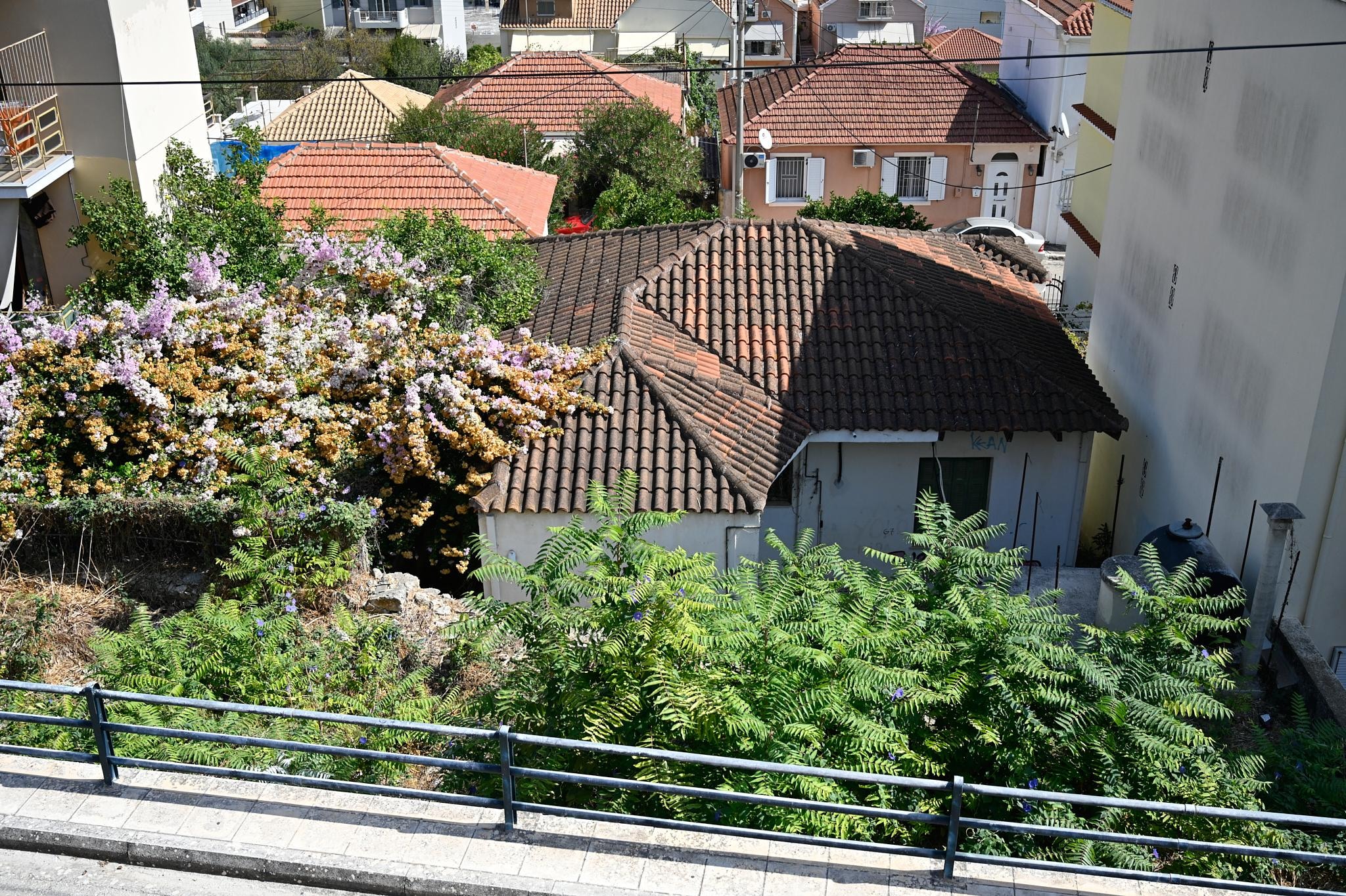 View directly across the street - still, some standard houses set up after the 1953 earthquake can be recognized despite extensions and makeovers