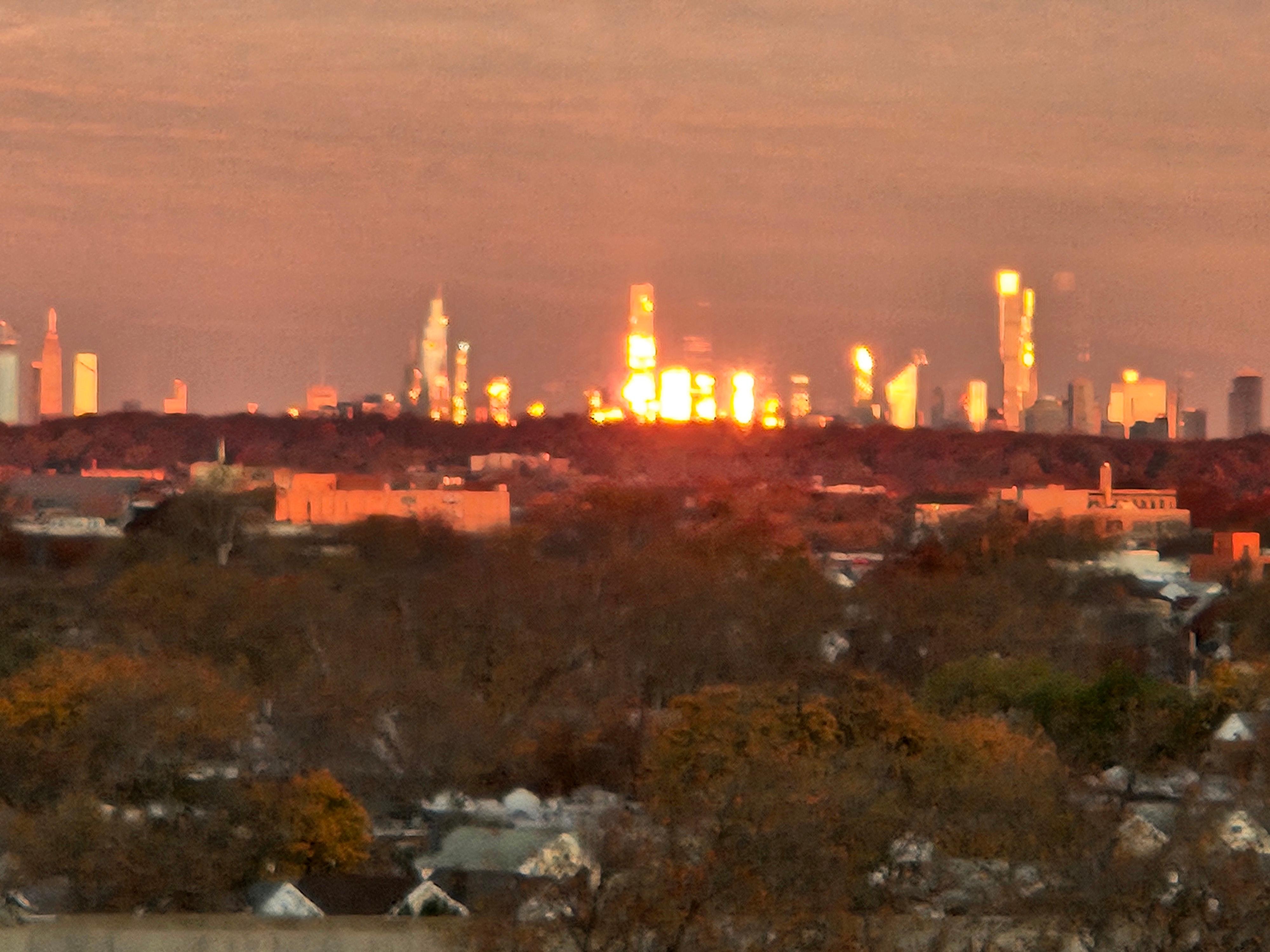 Sunrise reflecting on NYC skyline