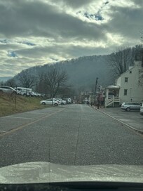 Too. Front view
Bottom. View down the street.