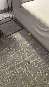 Dirty under tables and chairs.