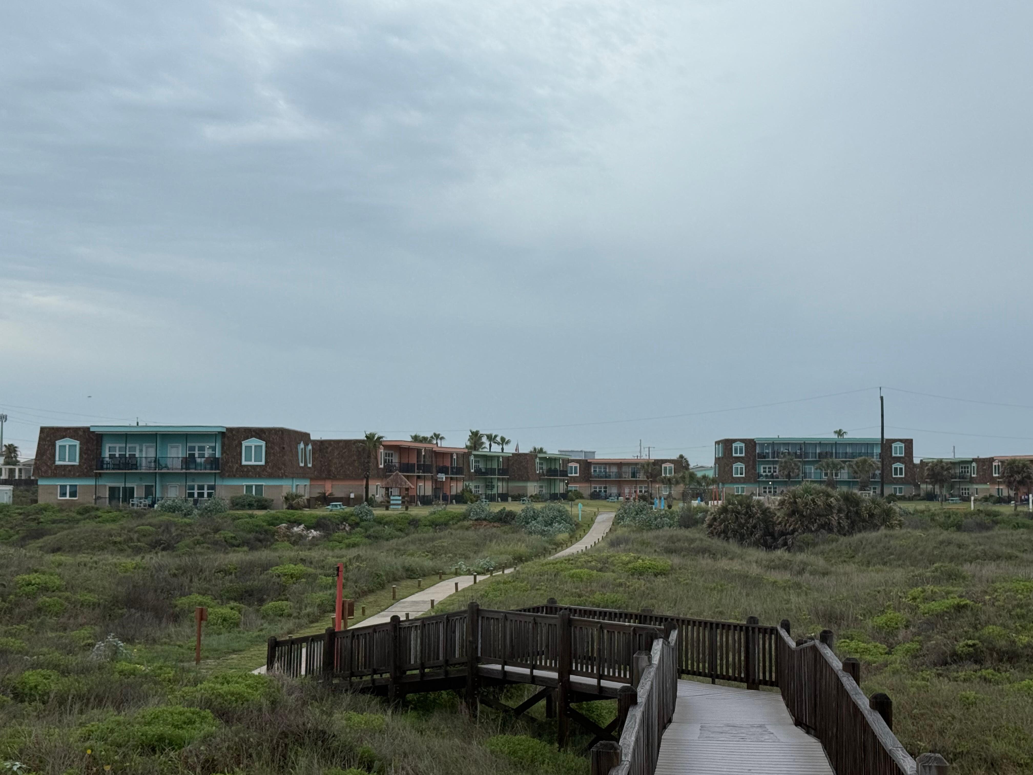 View of resort from boardwalk to beach