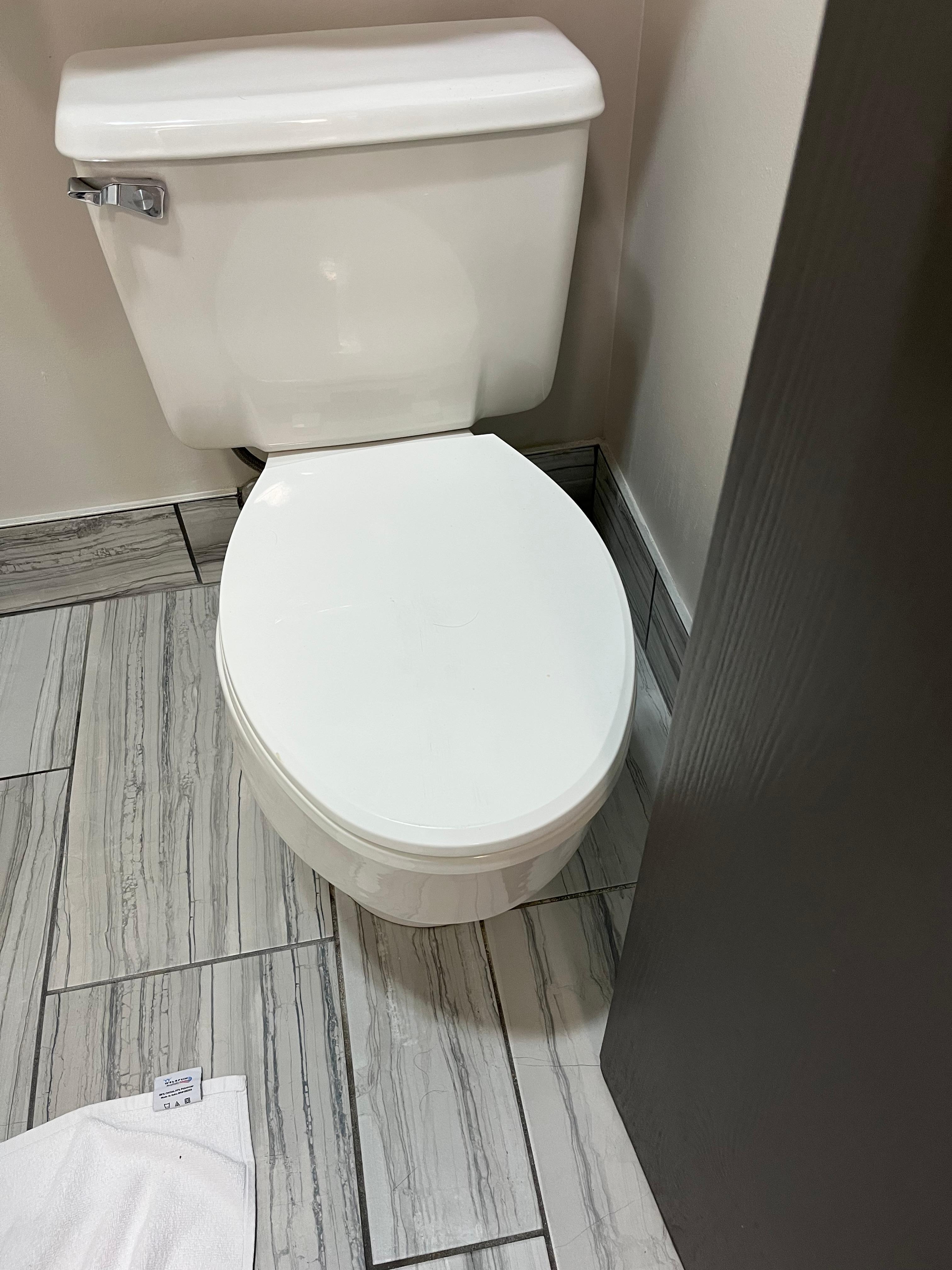 Low toilet. Very tight. 