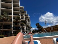 At the pool looking at the condo