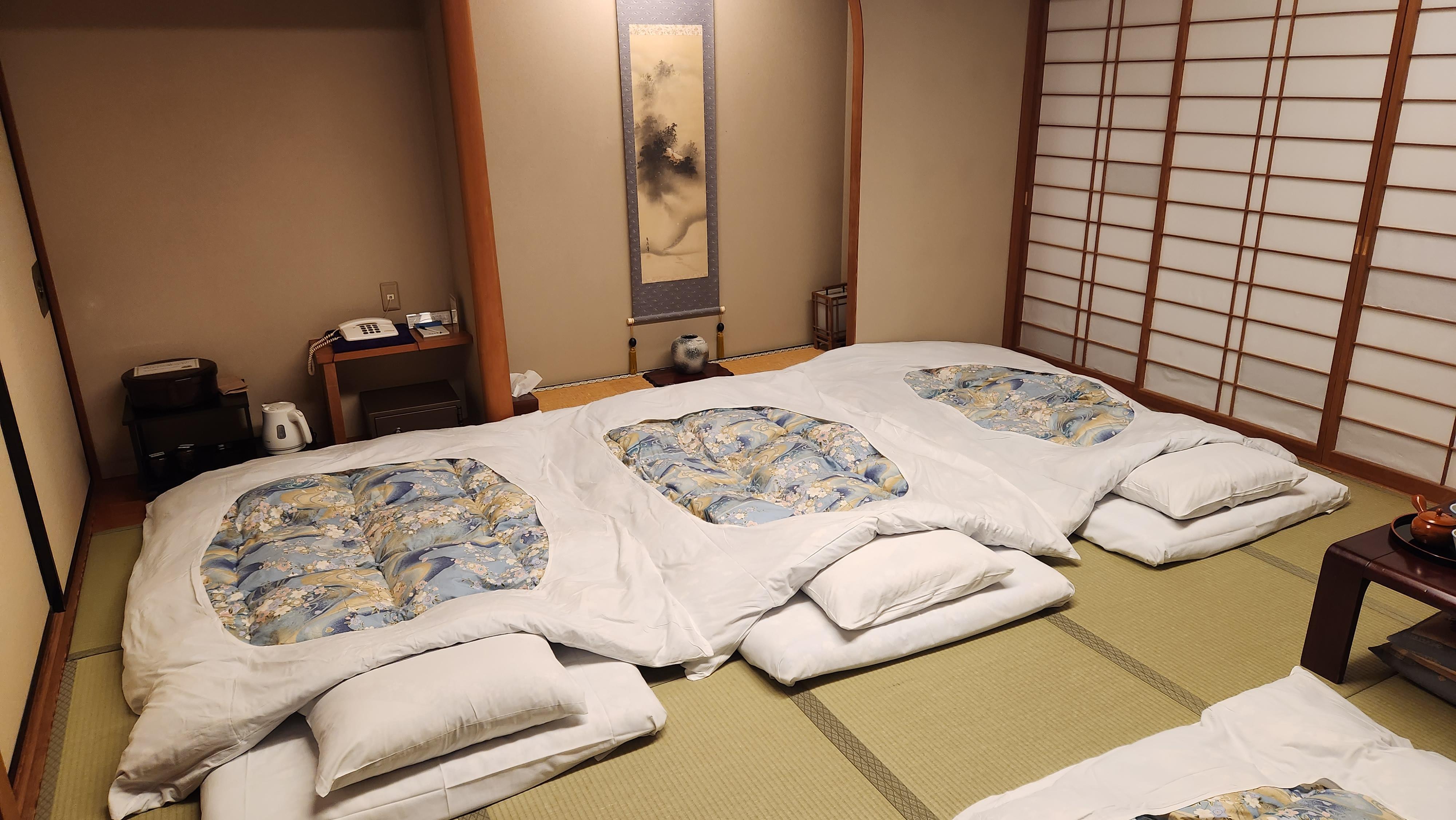 Traditional room with Futons set up by staff. The staff will come and set this up for you.