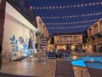 The other side of the pool/lounge area at noght