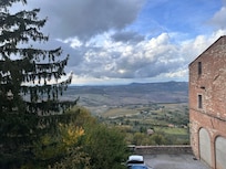 View without the fog. The parking lot below is where people would come to take photos.