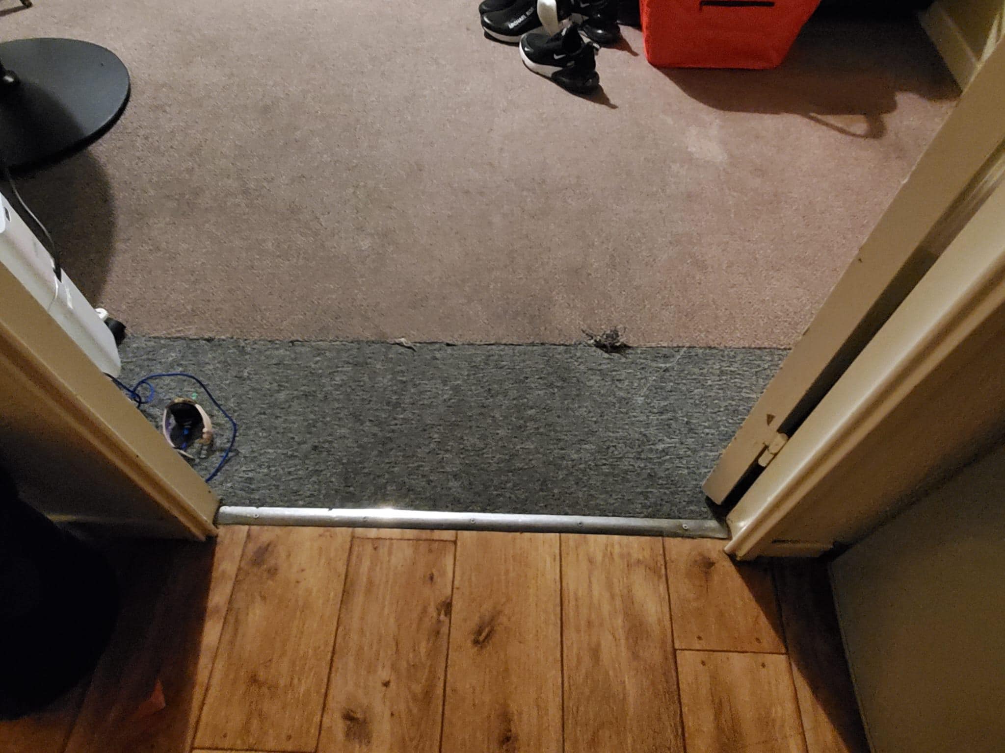Poor mismatched repairs to the cheap carpet