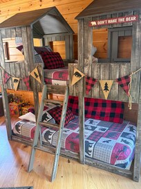 This is the loft where the kids can sleep and play and it is so kid friendly with games and other things!