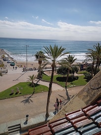 Poolside view of the beach and Mediterranean