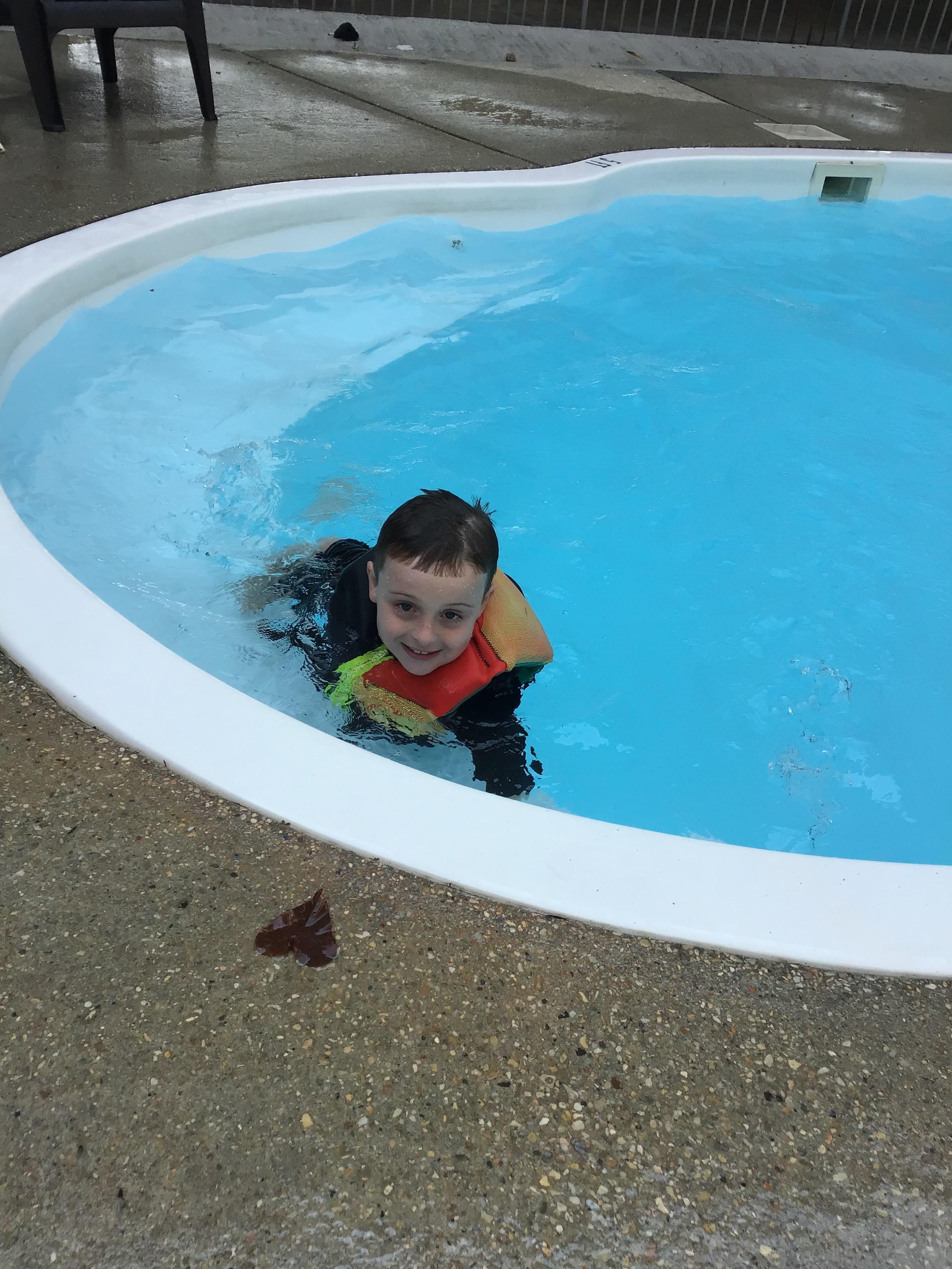 Our grandson in pool