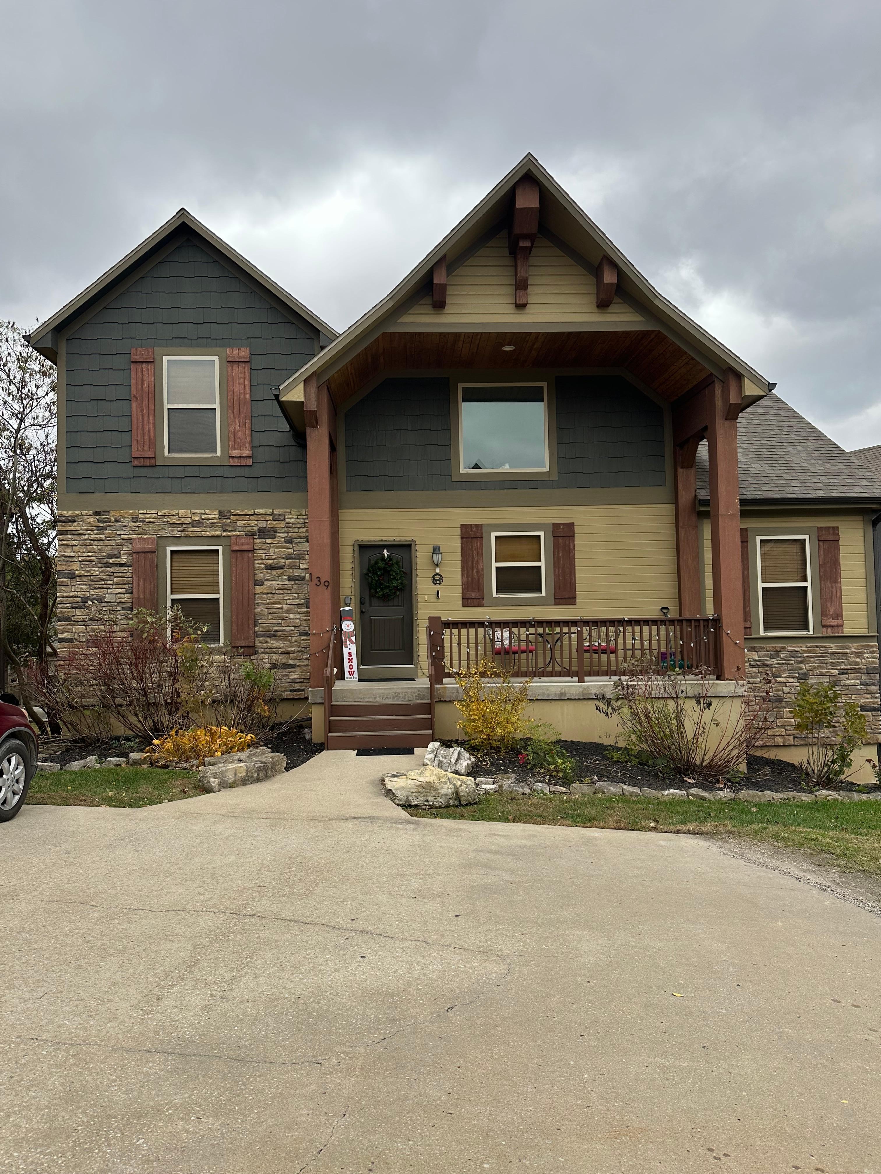 Outside of house! So welcoming! They already had the lights up for us! 