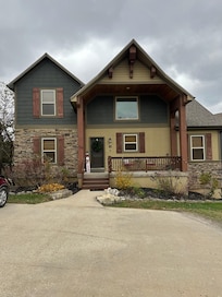 Outside of house! So welcoming! They already had the lights up for us!