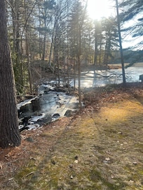 The babbling brook steps from the house.
