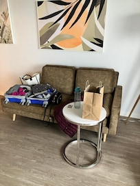 that loveseat has seen better days.. in 1985!