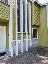 front entrance dirty - rot on walls