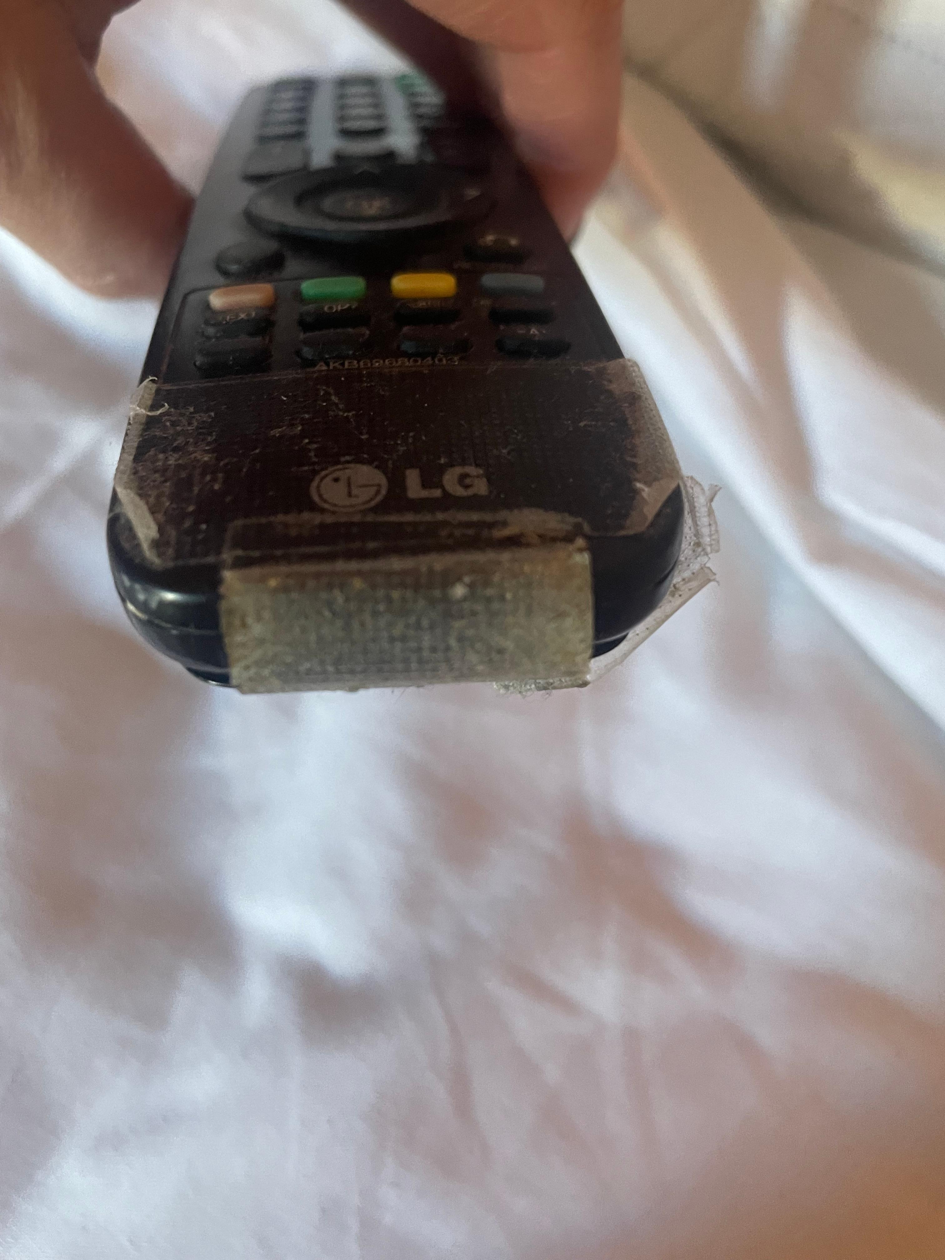 Remote for TV broken with dirty cellotape 