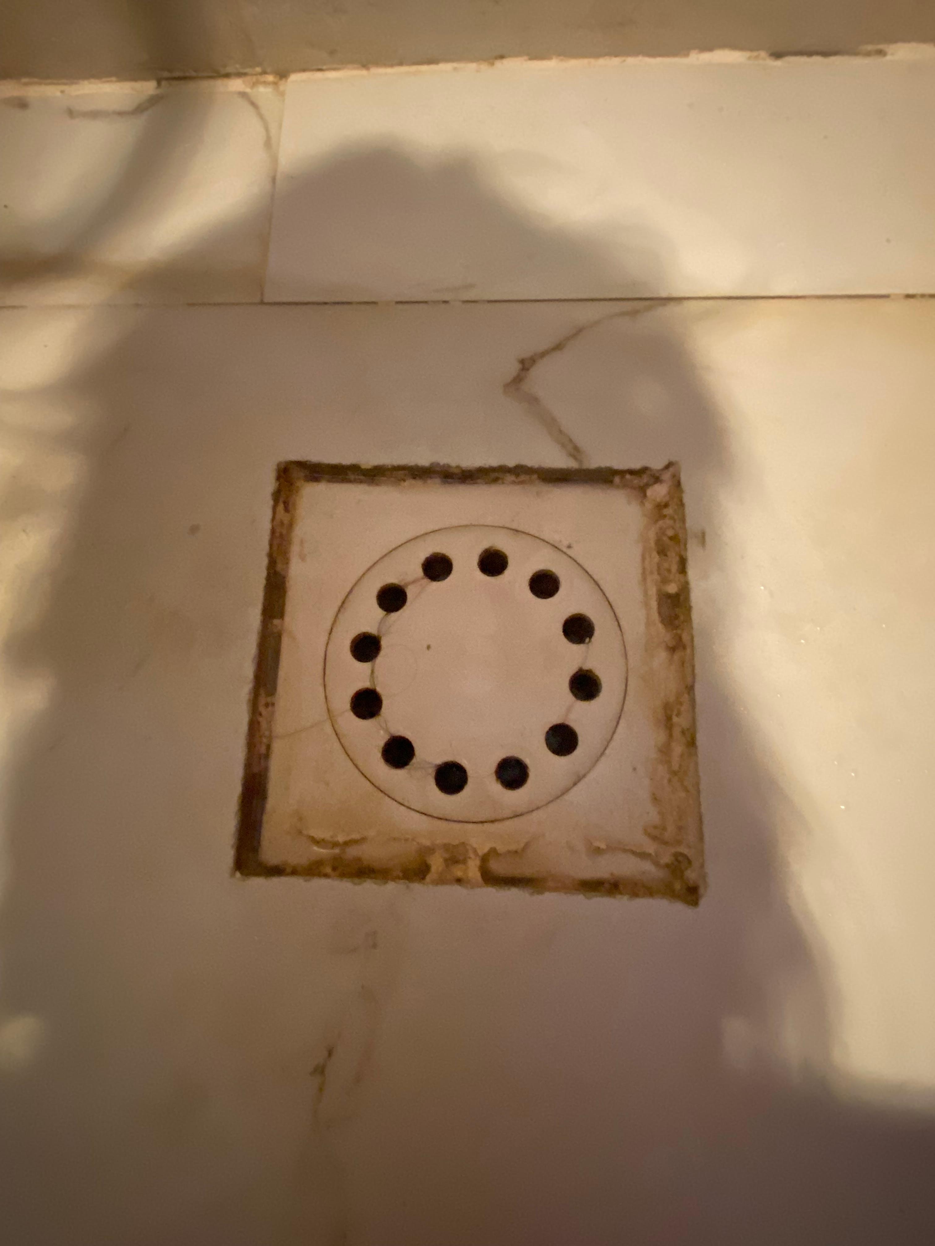 Dirty grubby shower tray 