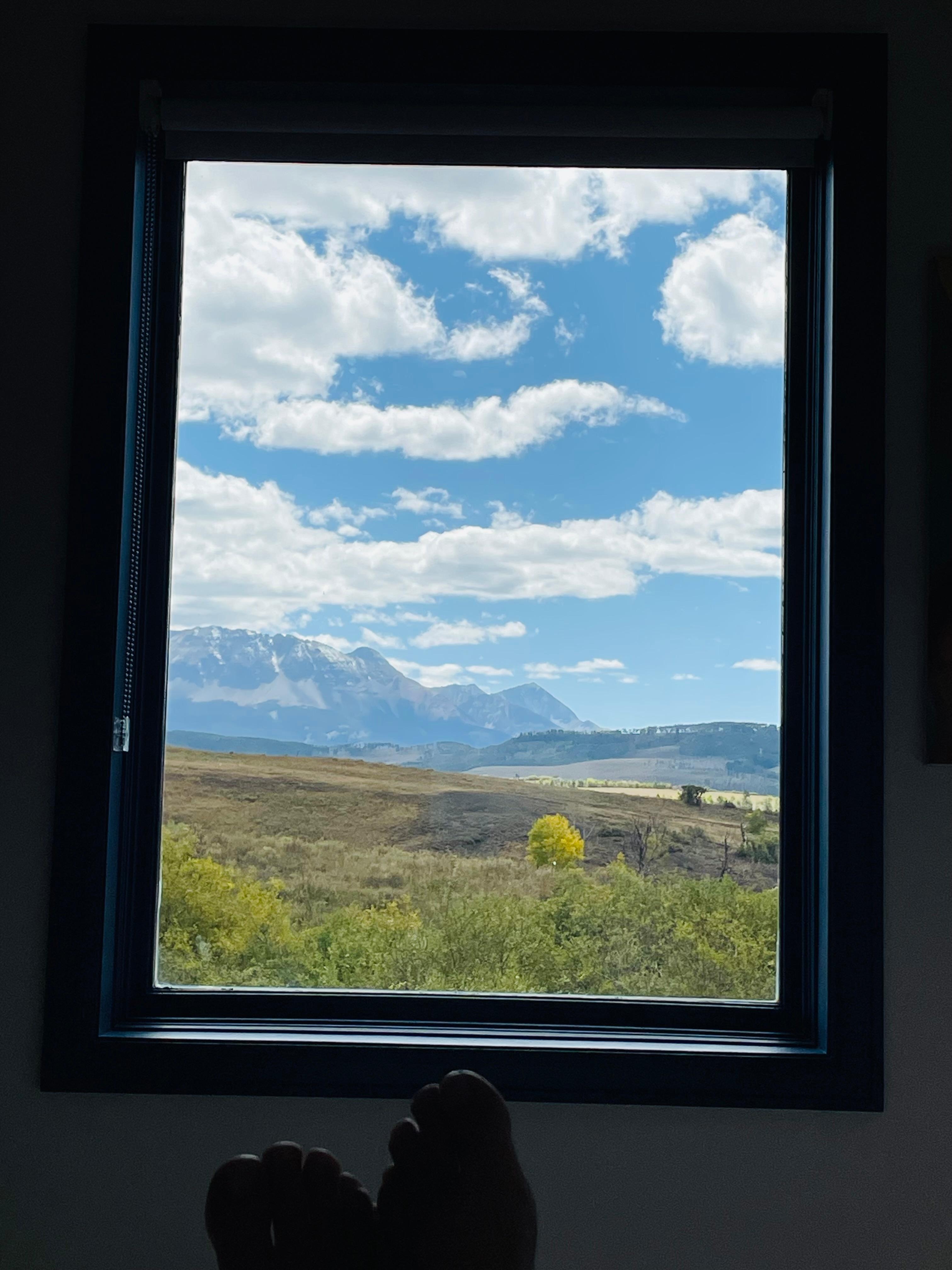 View from the bed and out the window, looks like a painting!