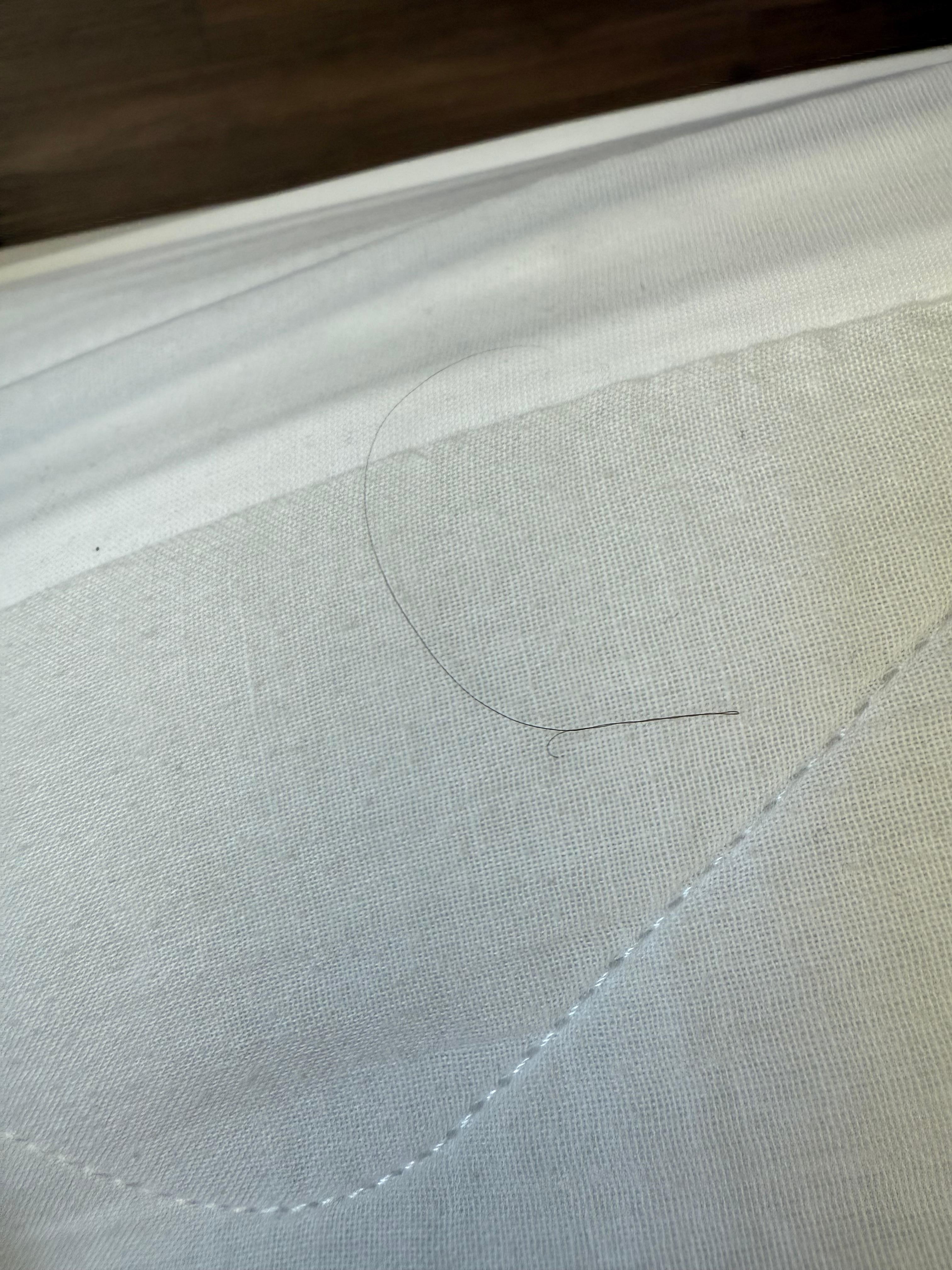 Hair on the mattress pad 