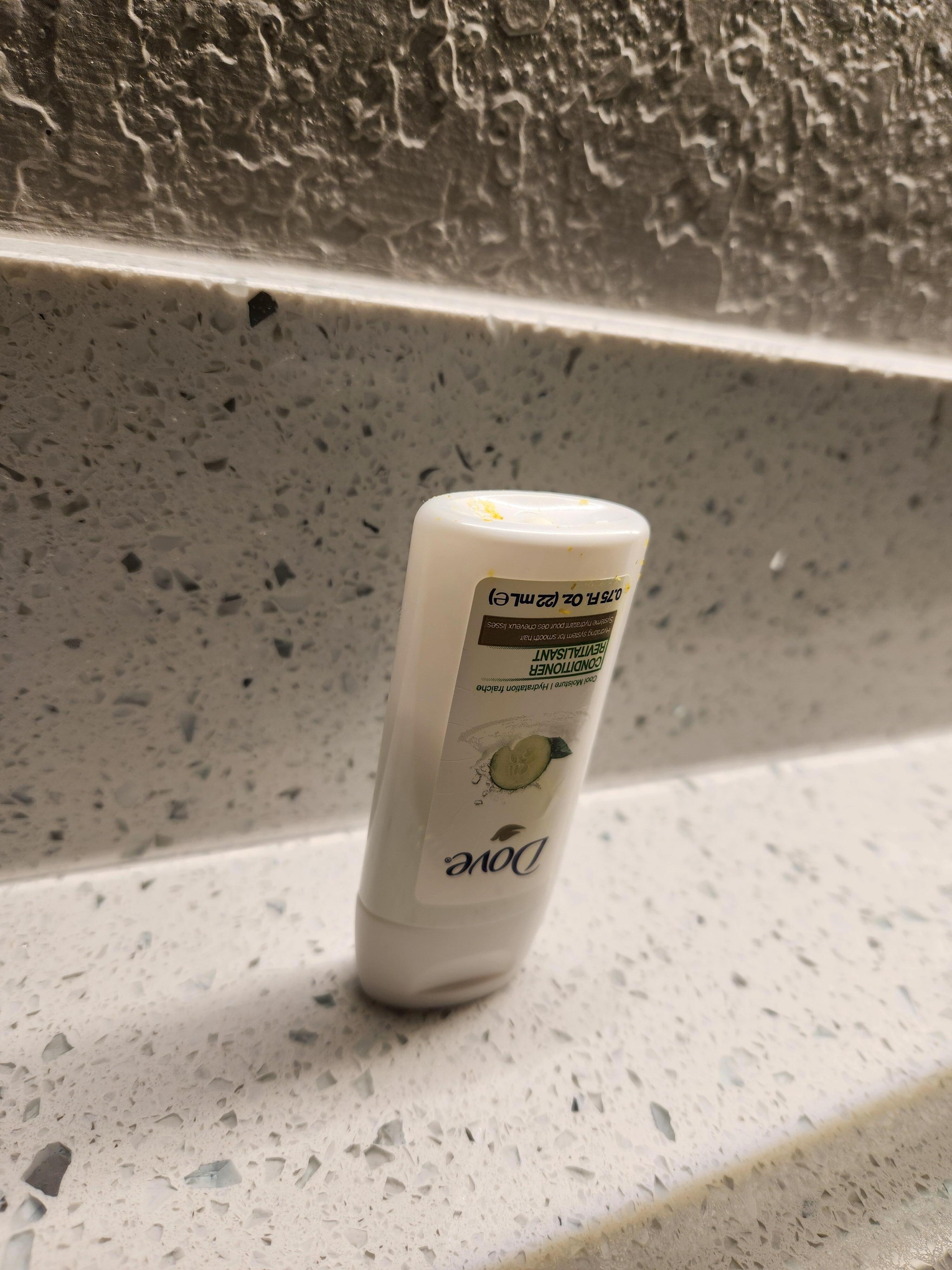 Half full conditioner bottle