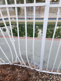 Dented and broken fence