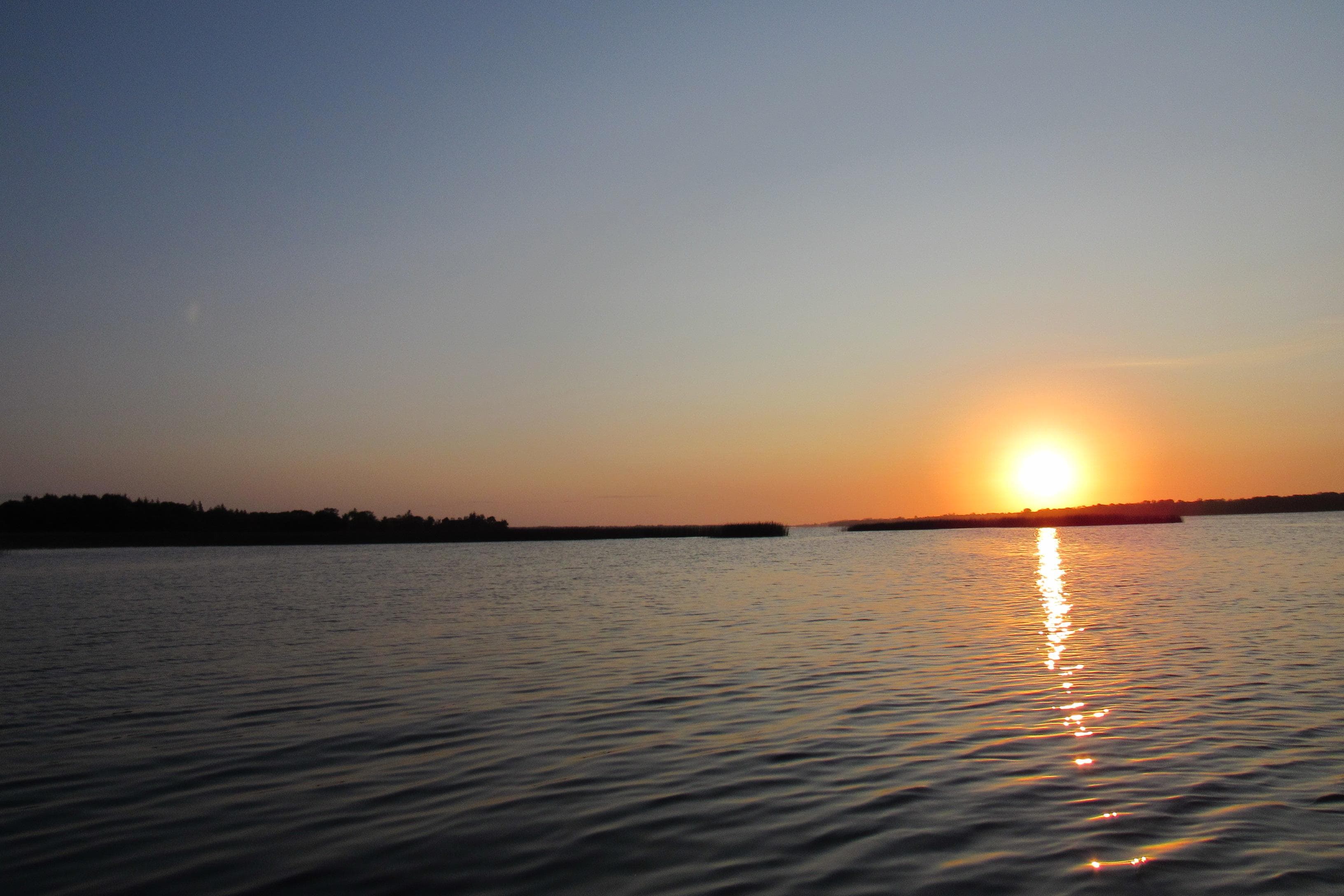 Sun rising out of the Derg.