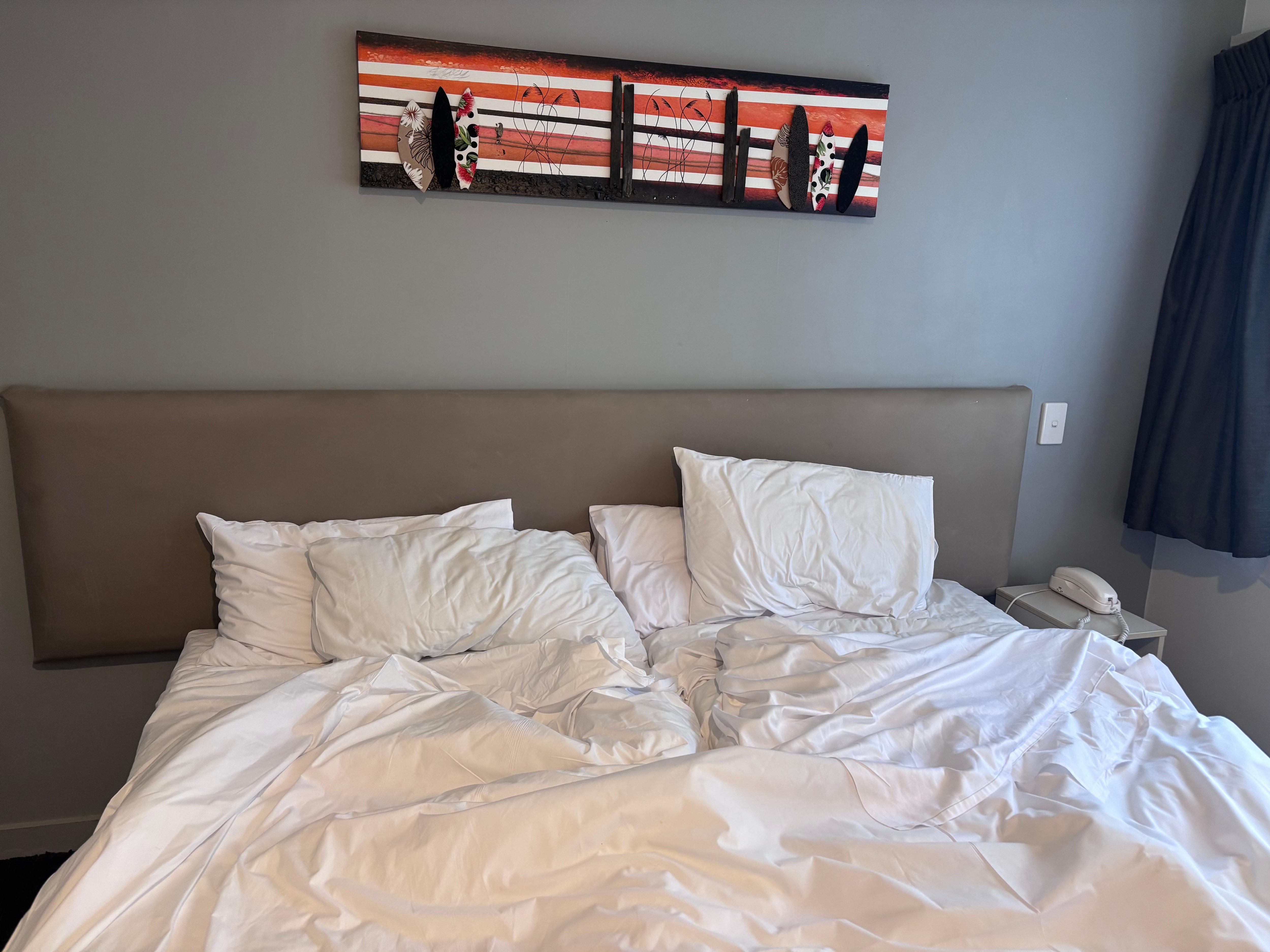 Only one bedside and no extra bedding, although bed was comfy. 