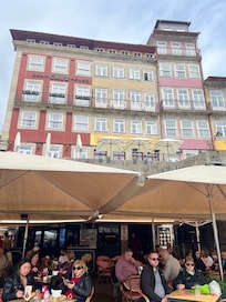Yellow tile building is the hotel.
