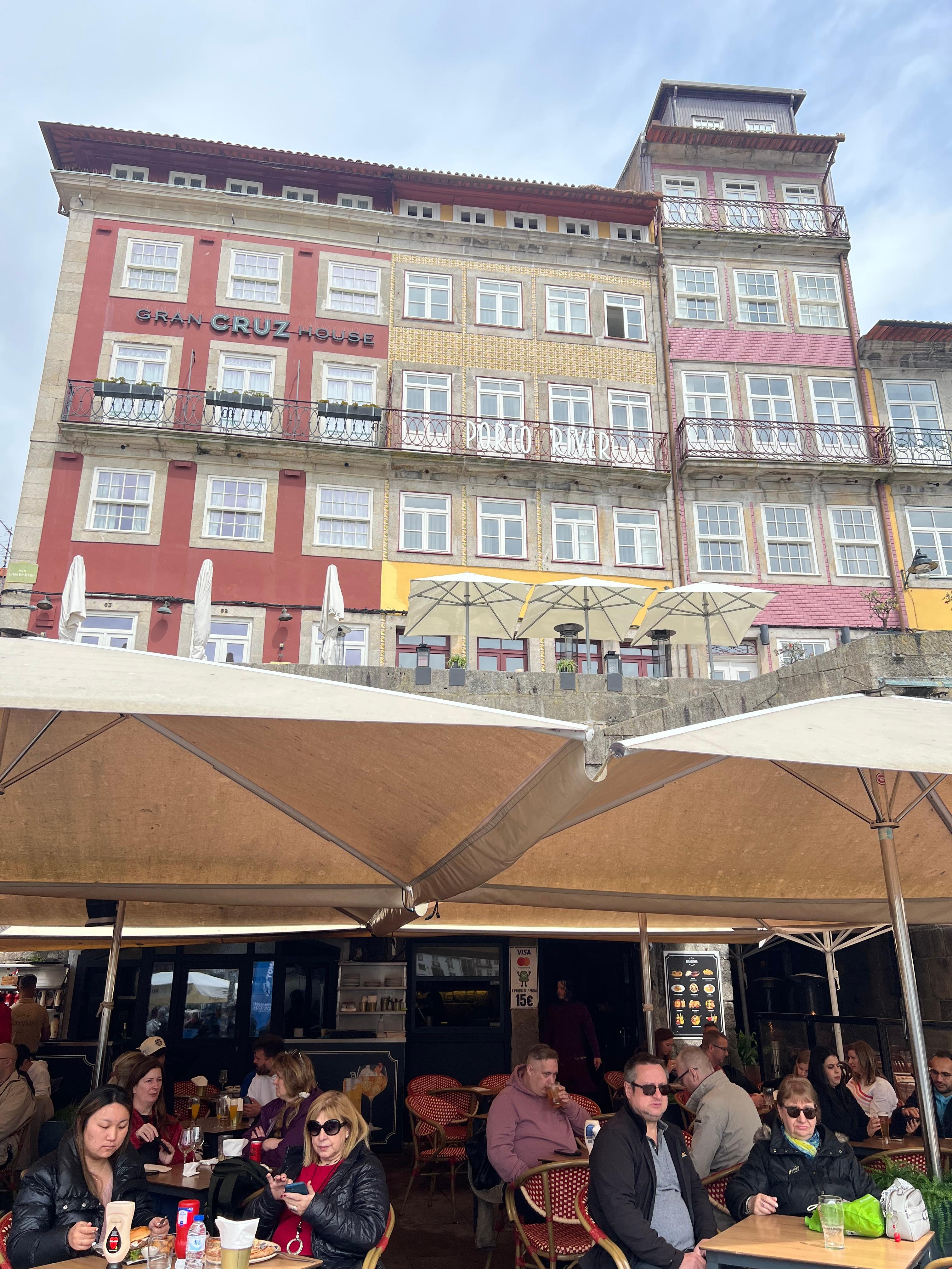 Yellow tile building is the hotel.