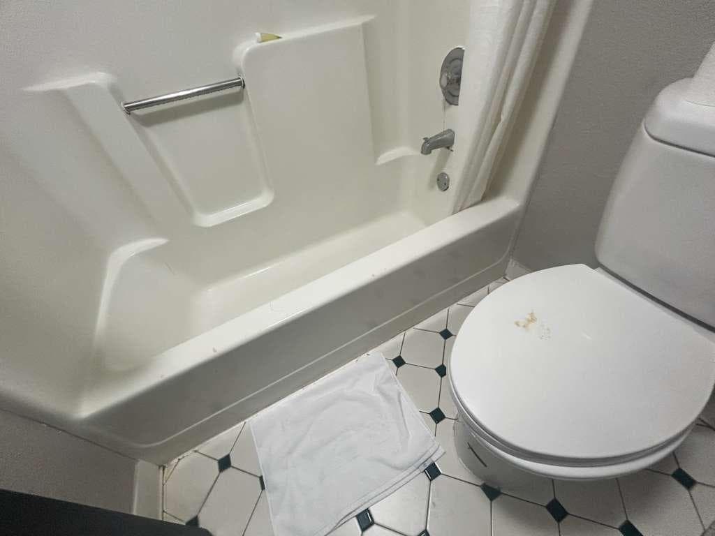 Cigarette burns on bath tub