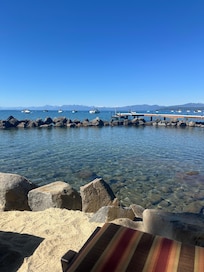 Private beach. Tons of lounge chairs. Kayaks for visitors to use as well.