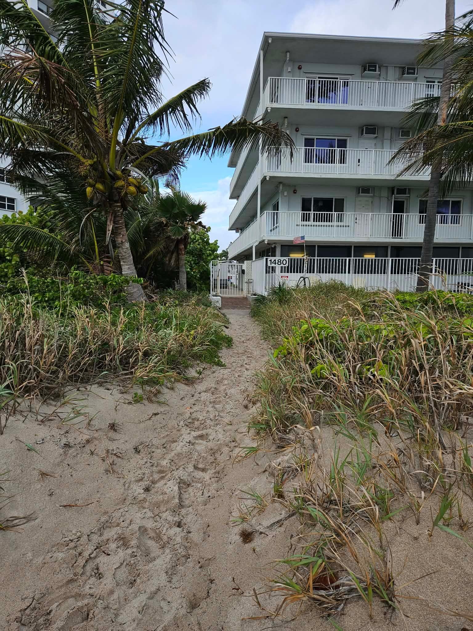 View of building from the beach. 