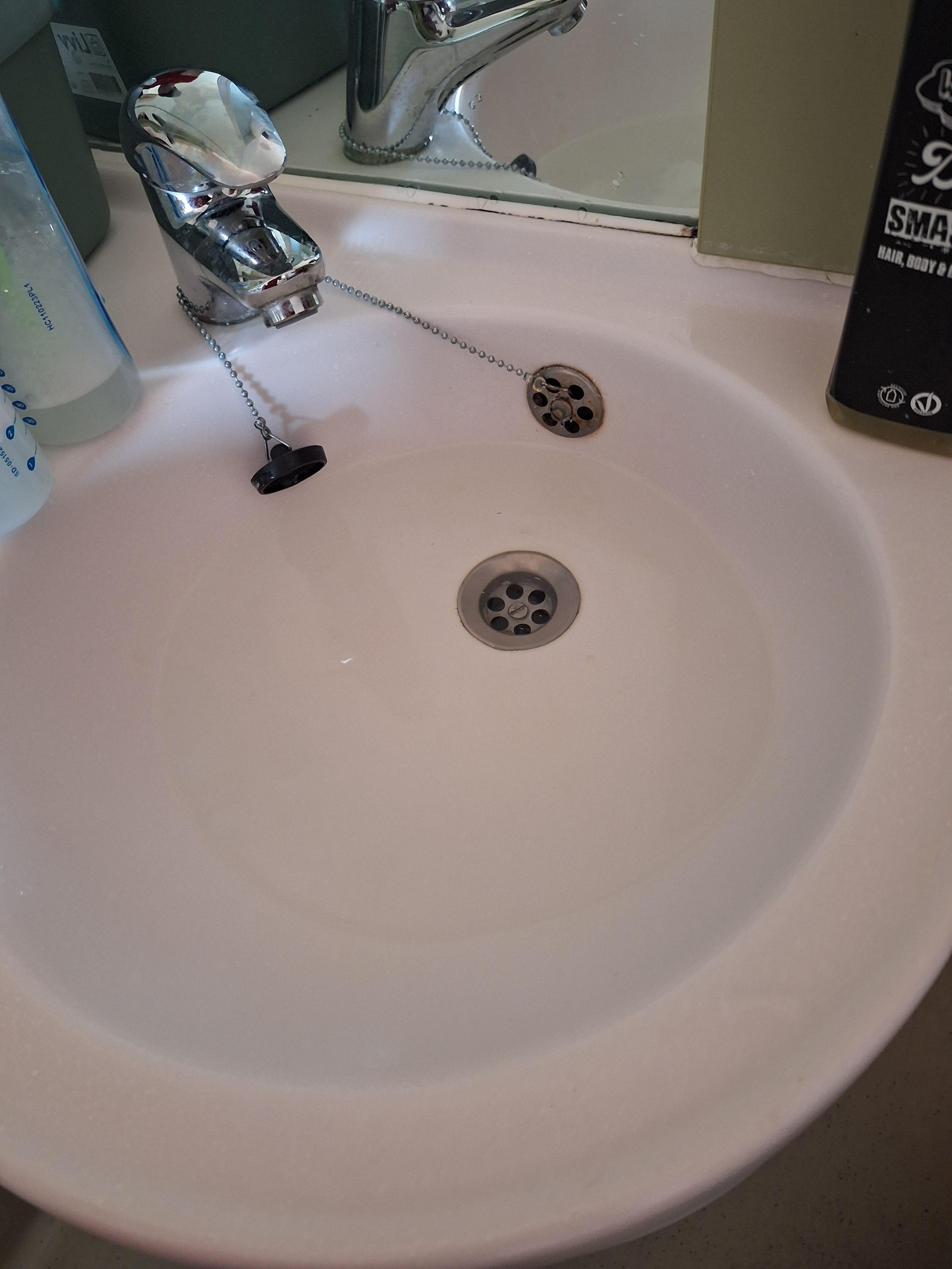 The sink was heavily clogged and took multiple minutes to drain.