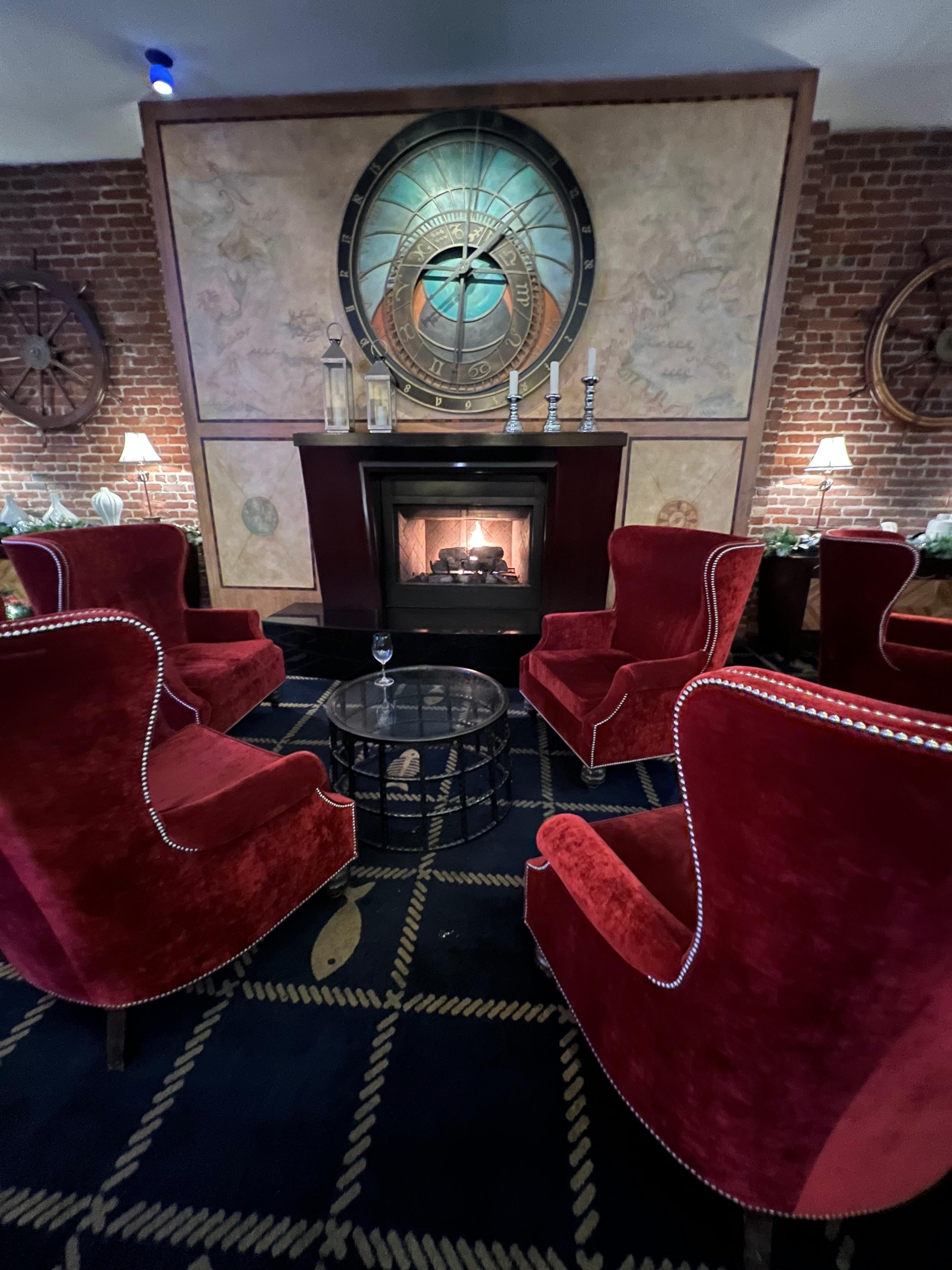 Cozy chairs by the fire. 