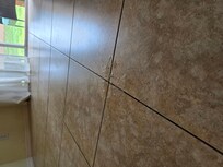 Puddle of water in living room from ceiling