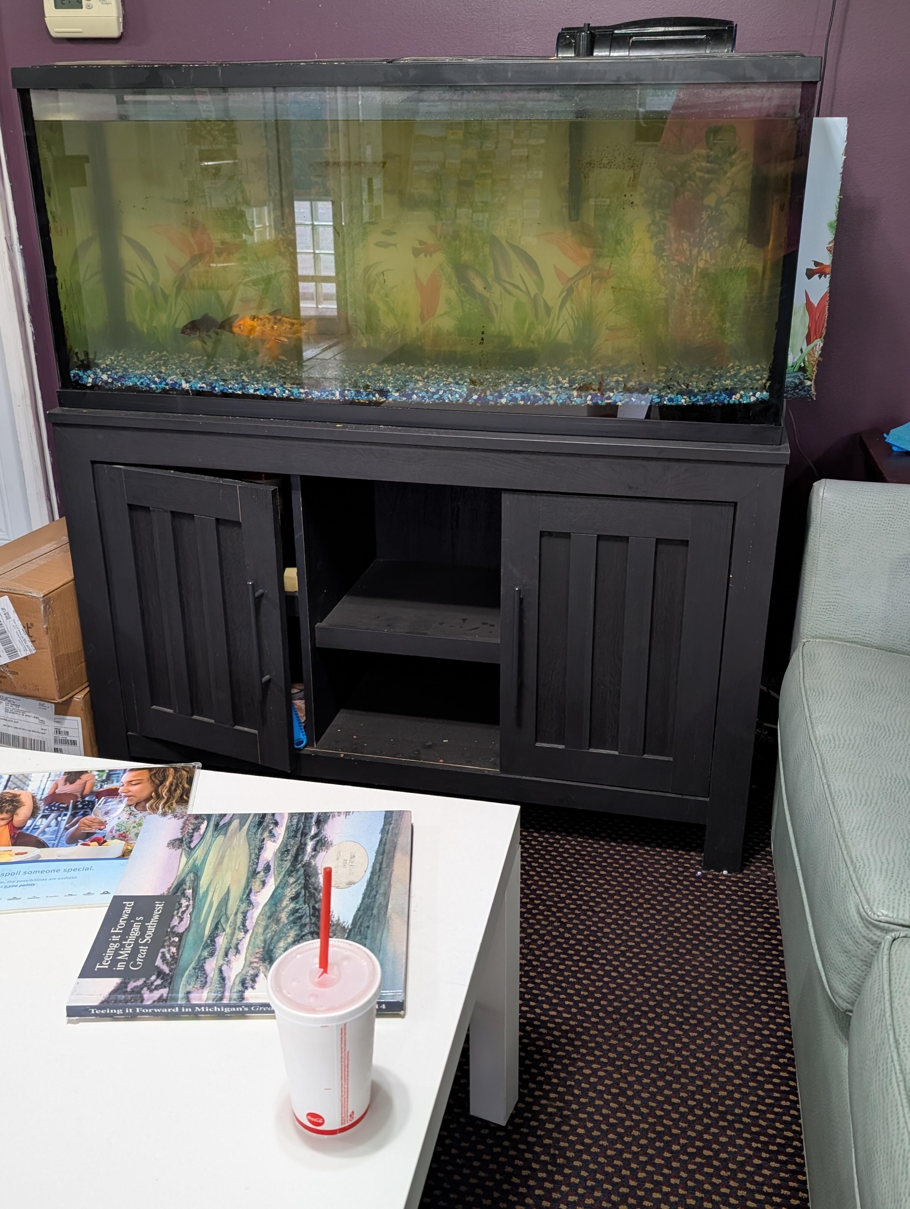 Even the fish tank was dirty and trash left on the table.