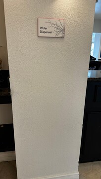 A water dispenser would be nice since there’s no complimentary bottle of water. But it’s not there.