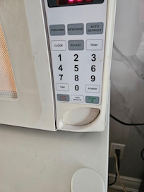 Tried to open the microwave and then it stuck like that